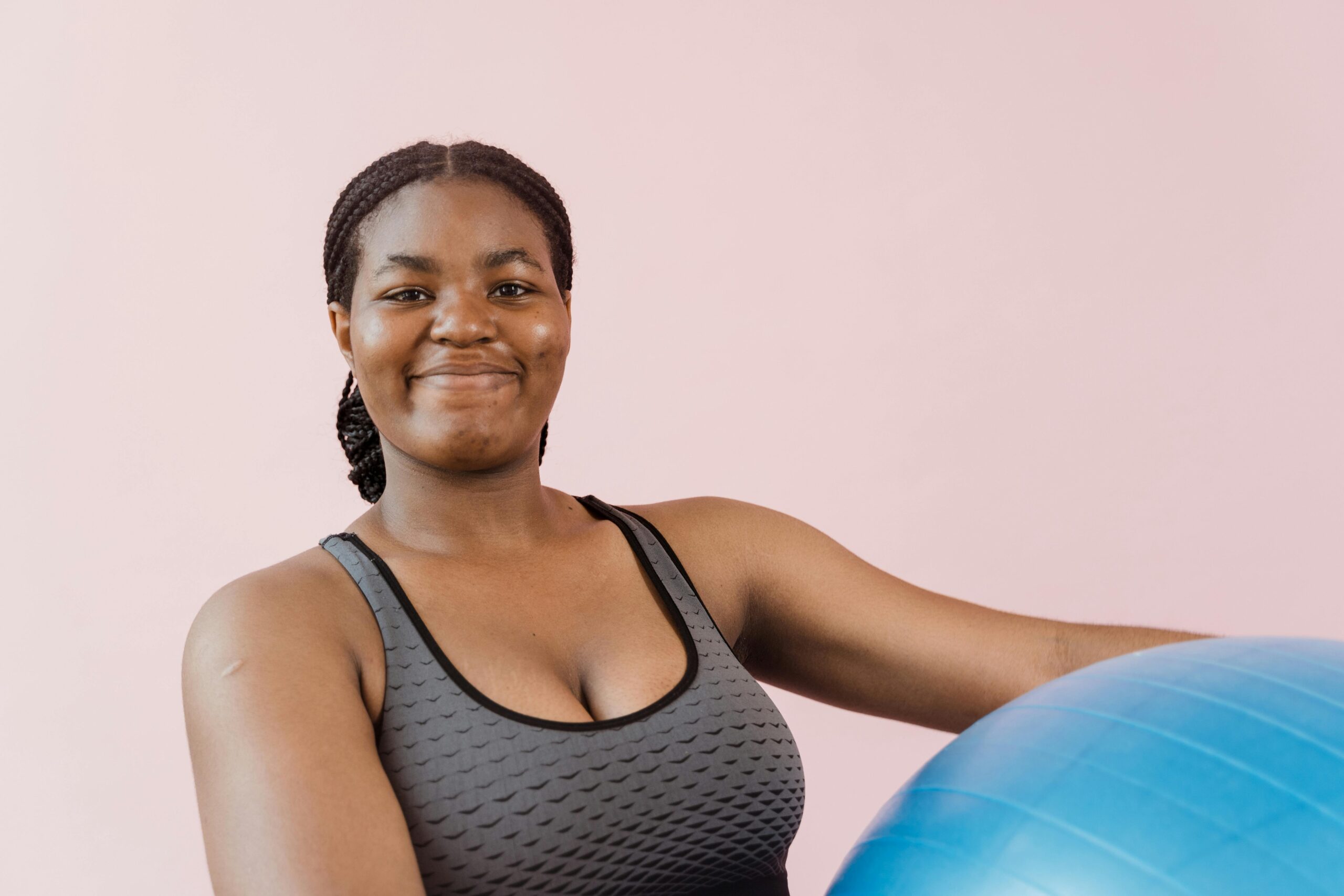 woman about to exercise with ball